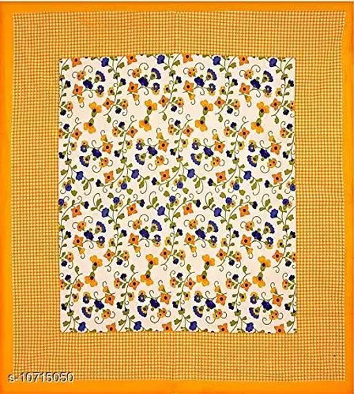 Yellow cotton Jaipuri queen size bedsheet with 2 pillow covers, soft and luxurious for a stylish bedroom