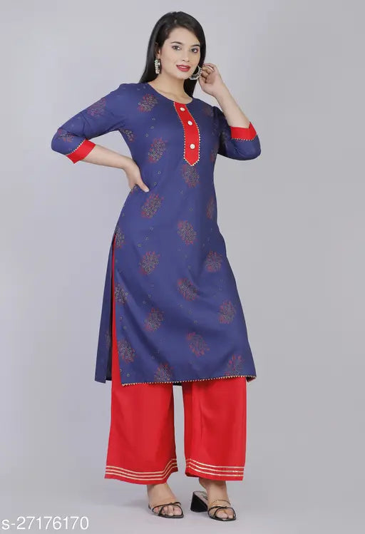 Rayon Aishani Kurta set with palazzos, three-quarter sleeves, printed net, on display. Maha Price Drop Sale. Available in M (38in bust, 15in shoulder, 36in waist, 40in hip, 45in length), L (40in bust, 15.5in shoulder, 38in waist, 42in hip, 45in length), XL (42in bust, 16in shoulder, 40in waist, 44in hip, 46in length). Indian party wear design