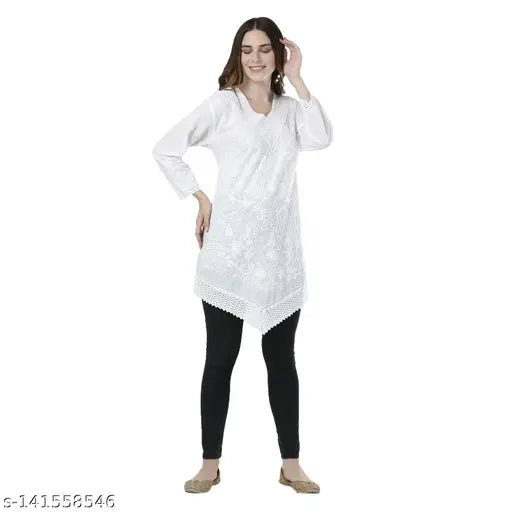 White Chikankari long-sleeve top, 100% cotton, embroidered design, perfect for casual outfits & vacations