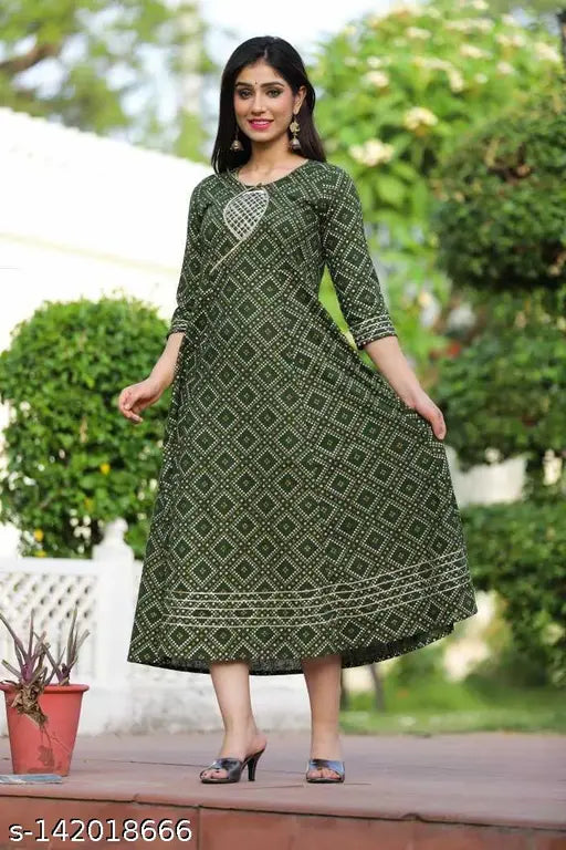Green cotton slub AAYUMI Woman Anarkali Kurta, featuring silver-toned ethnic motifs and keyhole neck, maxi length with flared hem - Indian ethnic wear