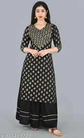 Black rayon straight kurta with skirt set, embellished with gold print gota lace, 3/4th sleeves, knee length, suitable for casual, party, travel, and evening wear