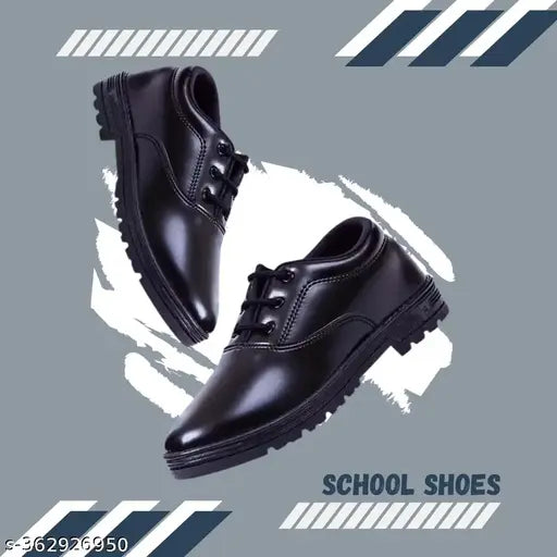 Black synthetic school shoes for kids, black casual sneakers for boys and girls. Lace-up design with PVC sole, ideal for running. Solid net pattern, available in various sizes from 4-5 years to 12-13 years. Made in India