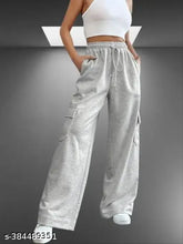 Grey solid plain cotton trousers with 6 pockets, suitable for home, office, and casual events. Breathable and comfortable for everyday wear. Made in India
