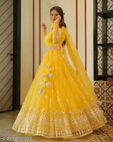Yellow traditional net embroidery Lehenga Choli for wedding party, embellished with intricate Indian craftsmanship
