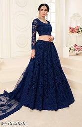 Embroidered green lehenga choli set with net fabric, heavy chain work, and diamond embroidery. Sizes: Semi-stitched (Lehenga waist 40", length 40"). Indo-western wear on display stand