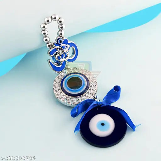 Blue plastic Evil Eye pendant amulet for protection and blessing, traditional Turkish design for car, home, office decor