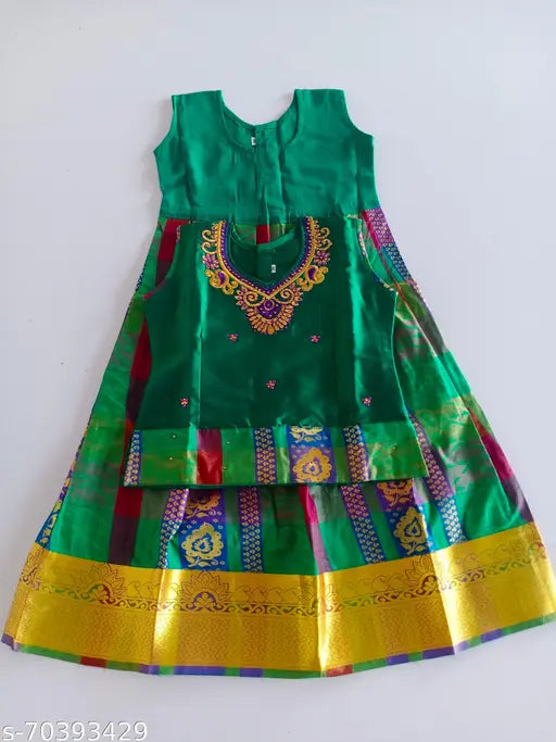 Gold neck and green lehenga set, acrylic fabric with aari work, sleeveless, suitable for children ages 1-7 years, Indian traditional attire on display