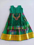 Gold neck and green lehenga set, acrylic fabric with aari work, sleeveless, suitable for children ages 1-7 years, Indian traditional attire on display