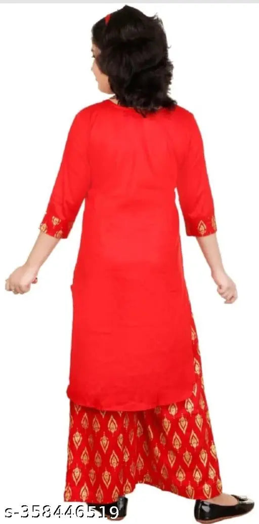 Girls Rayon Kurta Palazzo Set for Festive Party wear, printed net three-quarter sleeves, festive party outfit for children on display