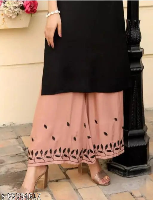 Rayon pilazo sait set, single piece in solid net, featuring palazzo bottoms and three-quarter sleeves from India