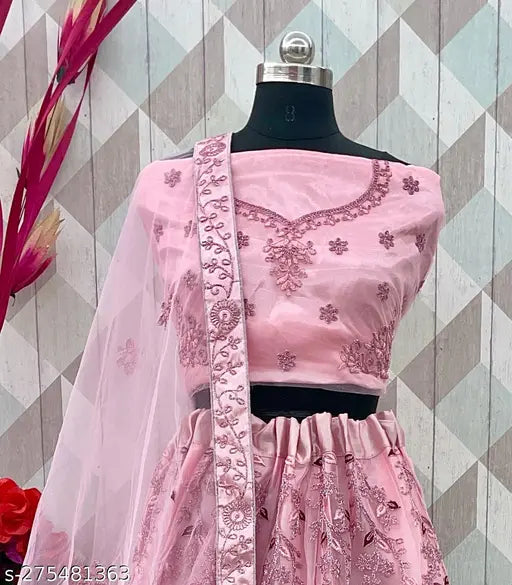 Art Silk pink embroidered net semi-stitched lehenga, unstitched blouse with dupatta by Gopinath Handwork. Free size, 3/4 sleeves, ideal for women's ethnic wear