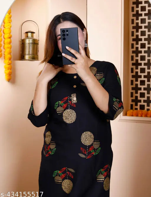 Trendy rayon kurta set with palazzos, printed net design, 3/4 sleeves & round neck - Indian fashion