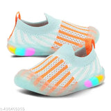 Knitted first walking shoes with light LED for kids, multicolor PVC sole and upper made of high-quality resin leather. Comfortable slip-on design suitable for various shirts and occasions