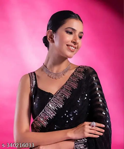 Black Georgette sequin saree with silver border, embellished net blouse