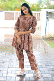 Designer cotton blend co-ords set with collared top, 3/4 sleeves, and gather surface, paired with cropped pants - Indian luxury fashion for daily wear