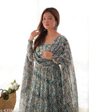 Light blue and light yellow Anarkali set: Heavy soft viscose straight fit Kurta with dupatta, featuring zigzag print and padded full churidar sleeves. Lace work, flair gown, microscrape lining, shawl style dupatta, and silk pent fabric." (125 characters)