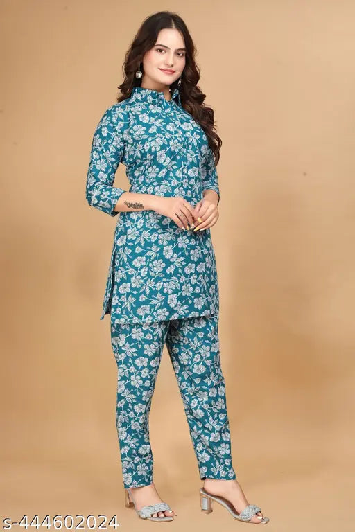 Trendy printed polyester top and palazzo set, cotton bottomwear with three-quarter sleeves. India-made fashion for women's XL size (39in bottom length, 46in hip size)