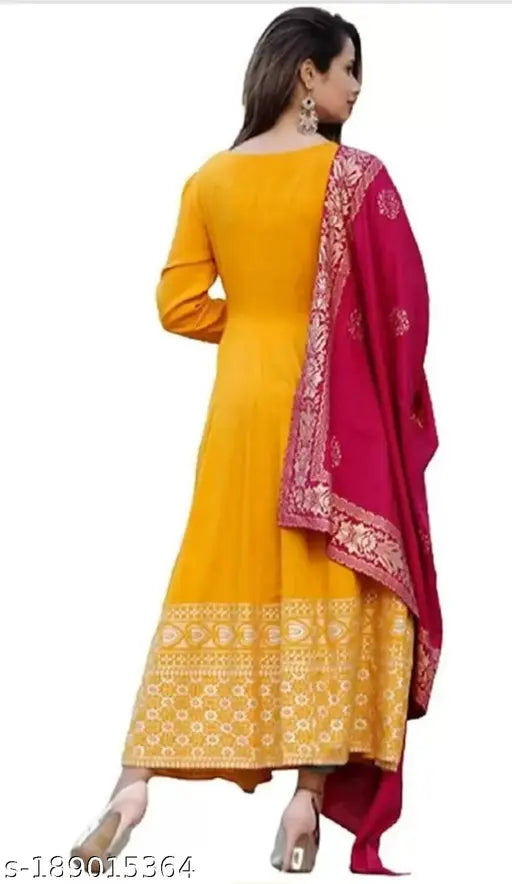 Yellow rayon anarkali kurti with stylish pink dupatta, ideal for haldi and mehndi ceremonies. Perfect for daily wear and special occasions