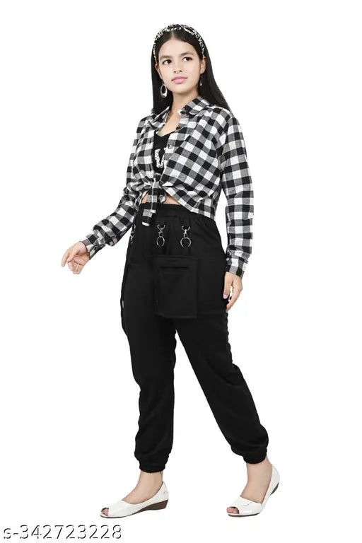 Cotton blend girls dress set with checked shirt, jogger pants, and solid print patterns in sizes 8-9, 9-10, 10-11, 11-12, and 12-13 years. Girls clothing set for various age groups from India