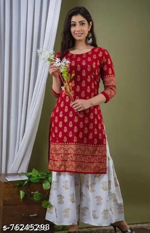 Red and white premium rayon printed kurti with palazzoo set, featuring 3/4th sleeves, round neck, and highlighted print design for women's fashion