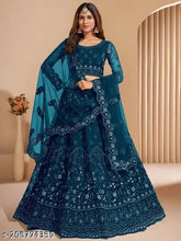 Black net embroidered Lehenga Choli and Dupatta set, semi-stitched. Traditional Indian outfit for weddings or festivals