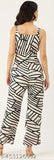 Printed white and black basic jumpsuit with waist tie-ups, sleeveless, polyester fabric, 2 pockets, casual style, India origin