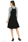 Black Lycra dungaree jumpsuit for girls, solid pattern and long sleeves