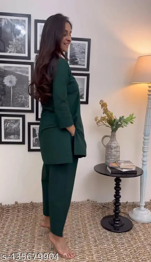 Green rayon kurta set with cotton palazzos, three-quarter sleeves, solid design for women, versatile formal wear