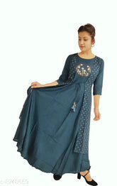 Rayon sequinned kurti, solid color women's gown with three-quarter sleeves. Close-up view." (123 characters)