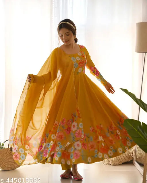 Organza silk Anarkali gown with Kali pattern, fully flaired, padded, and zippered, with matching dupatta in soft Organja silk with border Gotta Patti lace work. Indian-made, ready to wear