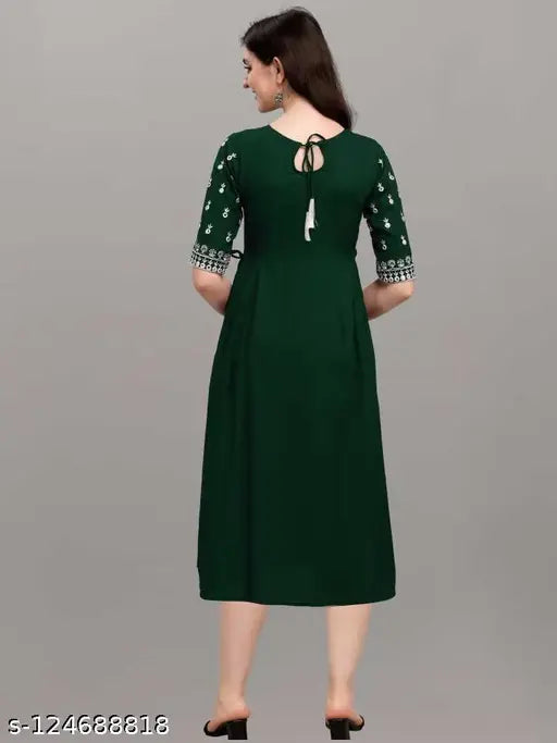 Green rayon embroidery kurti with three-quarter sleeves, featuring intricate Indian embroidery. Size: XXL (Bust 44in, Length 42in)