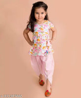 Pink cotton kurta and dhoti set for girls festive party wear, printed with A-line top and short sleeves. Colors may vary slightly from image. Available in sizes 2-3 years, 3-4 years, 5-6 years, and 7-8 years. Made in India