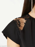 Black crepe round-neck jumpsuit with short sleeves by Miss Chase, size M. Solid black design with a belt and zip closure, featuring two side pockets. Made in India