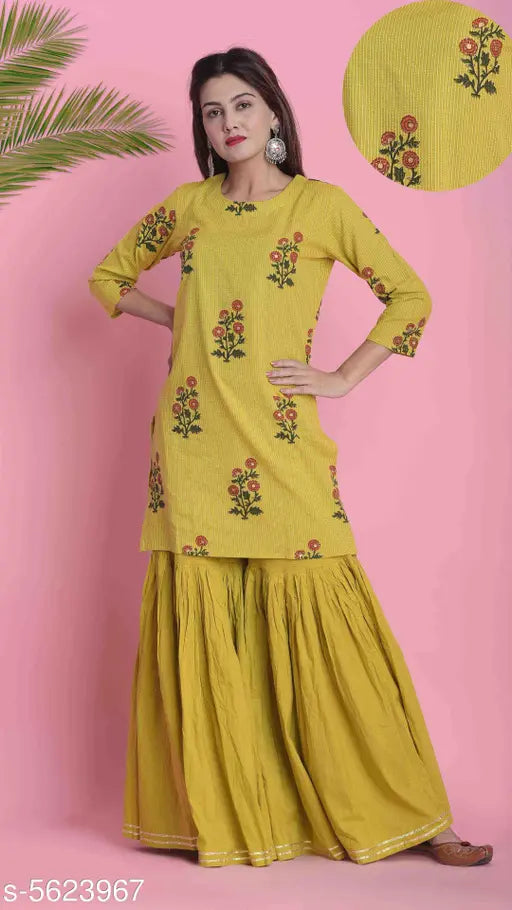 Cotton floral printed A-line kurta with sharara, three-quarter sleeves in XL, XXL. Indian women's ethnic wear
