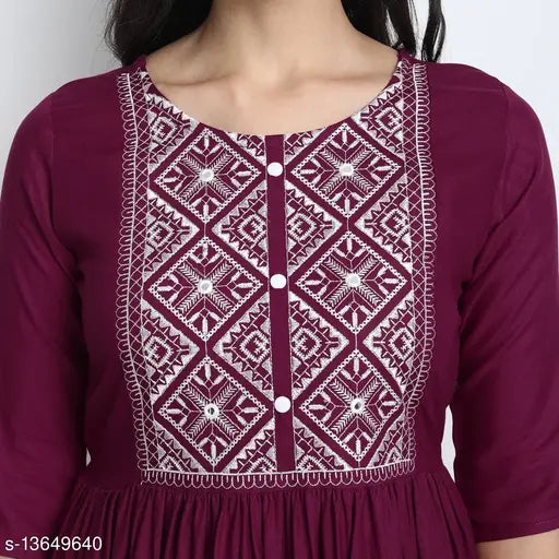 Rayon embroidered kurti, three-quarter sleeves. Voguish Indian women's fashion on mannequin