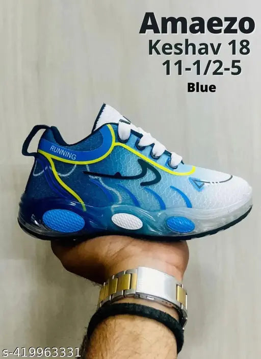 Blue mesh sneakers for boys with lace-up fastening and TPU sole, featuring a casual printed design and comfortable insole. Made in India