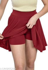 Polyester solid-color skater skirt with attached inner shorts, perfect for everyday wear. KLART classic stretchy design for versatile styling and flattering fit