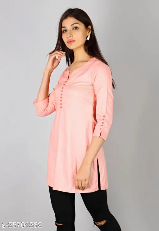 Peach rayon slub straight tunic kurti with bead detailing on neckline and sleeves, Indian women's fashion accessory