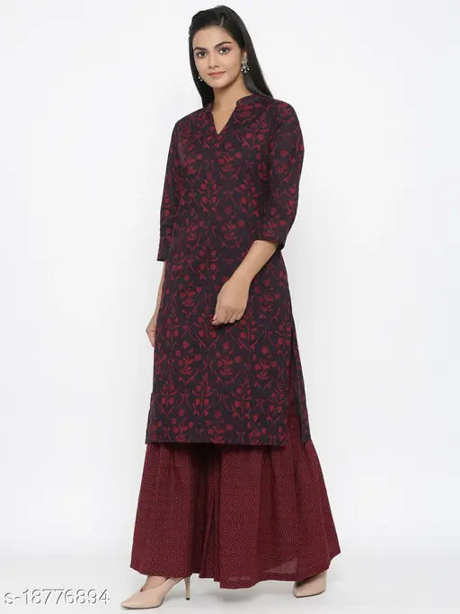 Maroon cotton Jaipuri floral print straight kurta Sharara set for festive and casual wear, three-quarter sleeves, Indian women's clothing on model at party