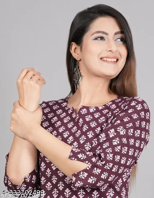 Women's cotton three-quarter sleeve printed short kurtis, jaipuri style from India, featuring colorful prints on natural fabric