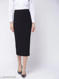 Solid polyester midi-length stretchable skirt, available in sizes 26, 30, 32, 34, 36, 40, 42, 44. Indian women's fashion garment on model