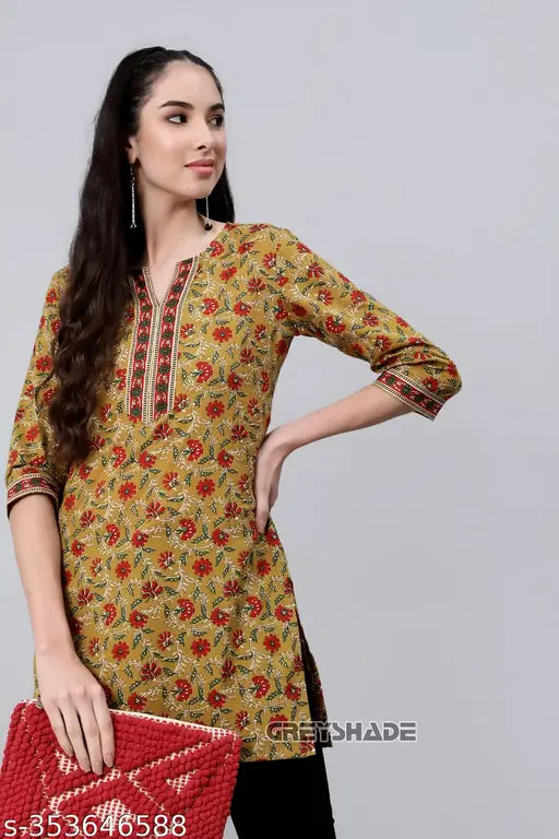 Floral print rayon V-Neck kurta with three-quarter sleeves, available in sizes S-XXL. Indian women's & girls' fashion wear on display