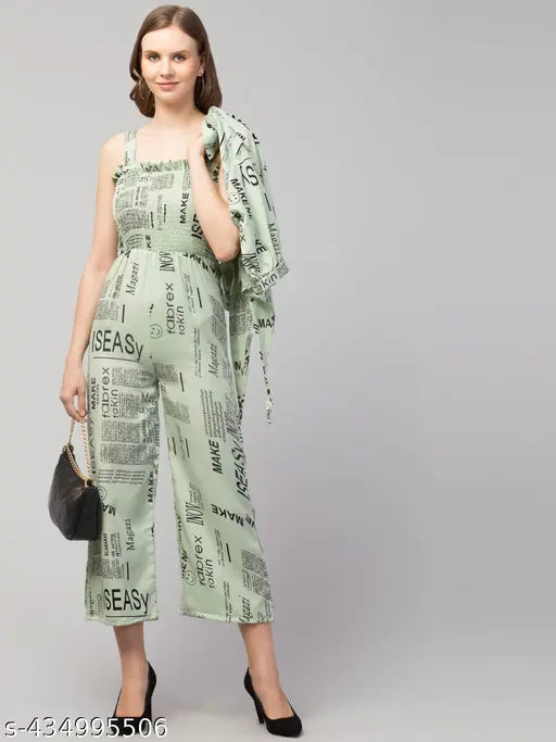 Green crepe three-quarter sleeve paperprint designer jumpsuit for women and girls, featuring a printed pattern