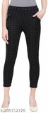 Trendy women's blue-black checked Lycra soft jeggings with pockets, ankle length and comfortable fit, available in various sizes including 24, 26, 28, 30, 32, 34, free size. Made in India