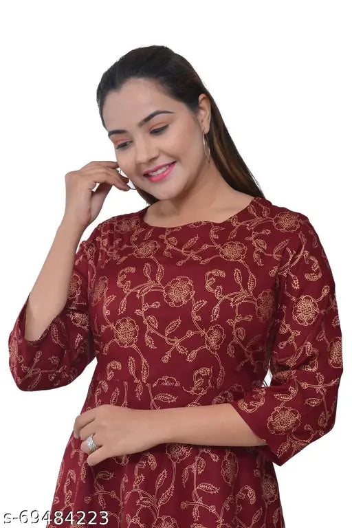 Women's rayon gold printed festival top, trendy and versatile for parties or weddings, three-quarter sleeve design on a Indian-made garment