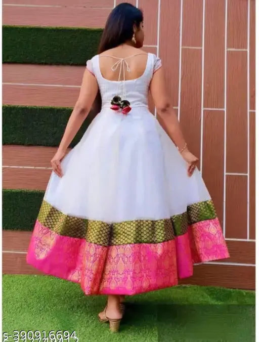 Chanderi cotton long-flair party wear kurti for women, features short sleeves and zari woven pattern. Ideal for weddings, parties, or daily wear." (120 characters)
