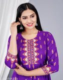 Vibrant purple viscose rayon long-tiered kurti with amb printed yoke and tassels, unique women's garment for special occasions