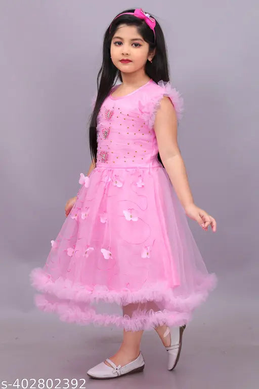 Pink net knee length girls' frock, embellished, sleeveless, A-line silhouette, India origin