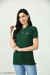 Green cotton printed polo shirt, sustainable and eco-friendly women's wear with embroidered logo and natural wood buttons