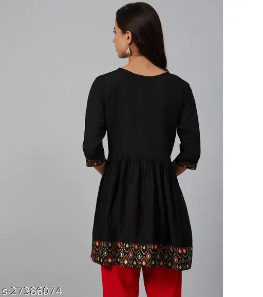 Viscose Rayon A-line Chitrarekha Superior Kurti, black yoke design, three-quarter sleeves, printed combo. Indian women's fashion on mannequin